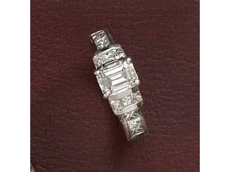 Appraisal: DIAMOND ENGAGEMENT RING k white gold centering one emerald cut