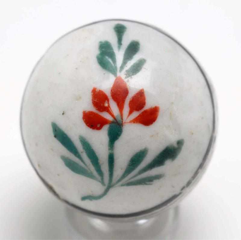 Appraisal: Large Flowered China Marble Description Glazed flowered china with a