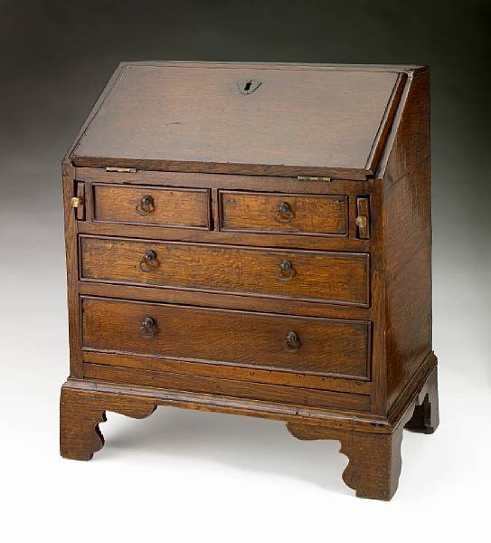 Appraisal: A George III oak miniature slant front desk fourth quarter