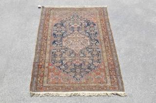 Appraisal: Persian Area Rug Persian rug in shades of blue and