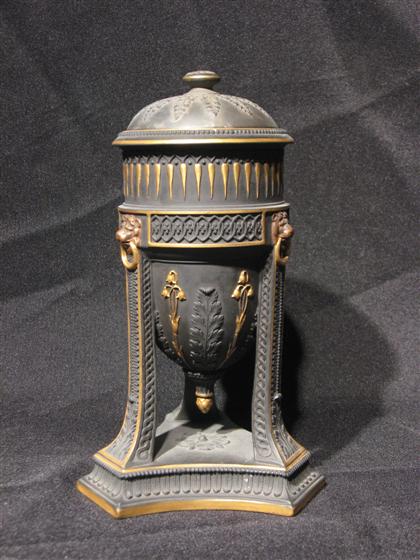 Appraisal: Wedgwood black basalt covered urn on stand H in PROVENANCE