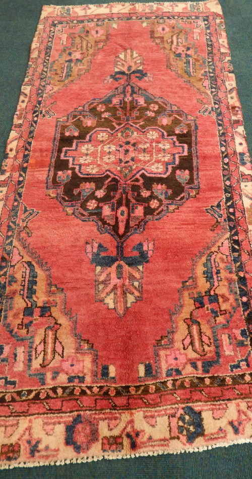 Appraisal: A Hamedan rug with a central pole medallion on a