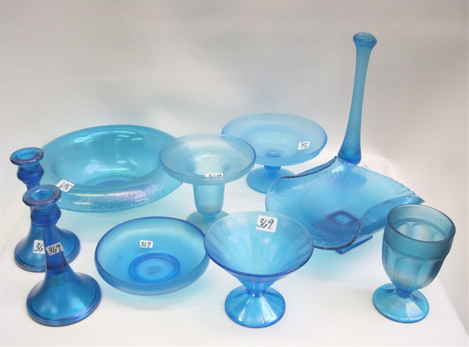 Appraisal: TEN PIECES BLUE STRETCH GLASS bowls to D pair candlesticks