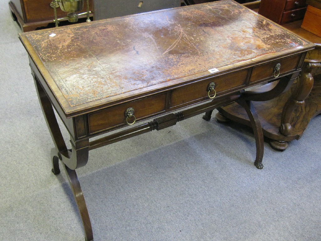 Appraisal: Lady's writing table with leather insert on x-frame supports on