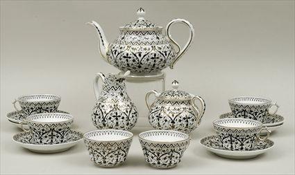 Appraisal: Continental Moorish-Style Gilt and Black Enamel Porcelain Tea Service Comprising