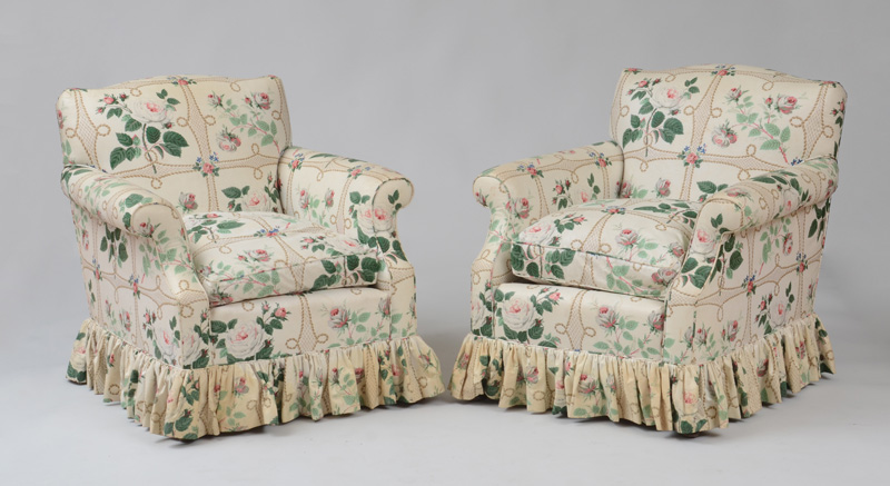 Appraisal: PAIR OF LARGE CHINTZ UPHOLSTERED CLUB CHAIRS With serpentine backrest