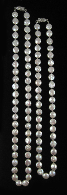 Appraisal: TWO WHITE COIN PEARL NECKLACES including a - inch necklace