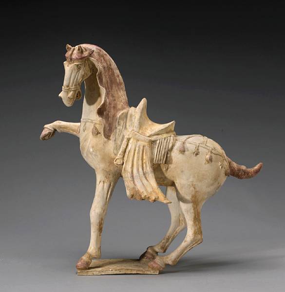 Appraisal: A painted pottery prancing horse Tang Dynasty Its right front