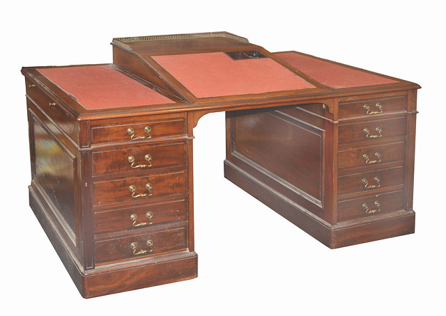 Appraisal: A VICTORIAN MAHOGANY LIBRARY DESK the rectangular top with writing