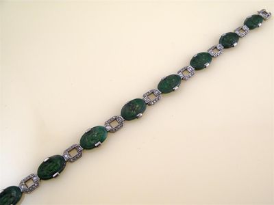 Appraisal: An Art Deco jade and diamond bracelet The white gold