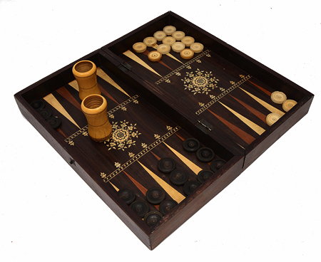 Appraisal: AN ANGLO-INDIAN COLONIAL ROSEWOOD AND IVORY INSET BACKGAMMON AND CHESS