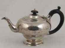 Appraisal: A silver tea pot on single foot hallmarked London weighing