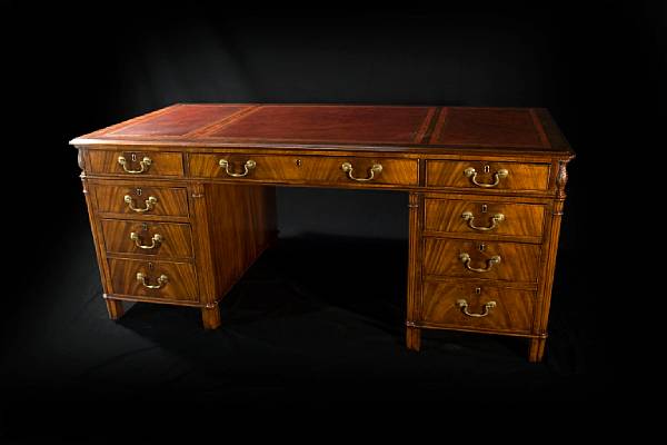 Appraisal: A George III style mahogany partner's desk height in width