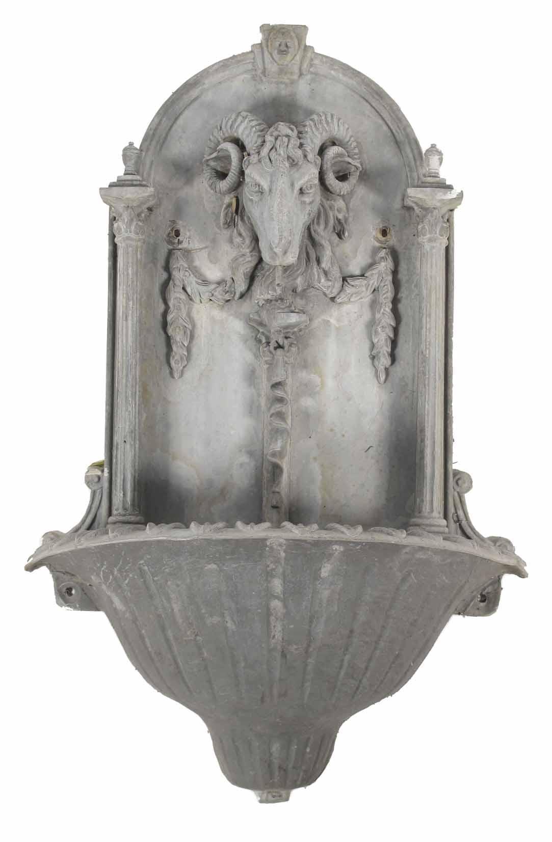 Appraisal: A lead wall fountain