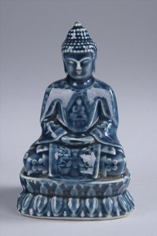 Appraisal: CHINESE MONOCHROME BLUE PORCELAIN FIGURE OF BUDDHA Qing Dynasty -