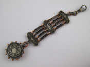 Appraisal: A silver gold and niello chatelaine locket marked approx cm