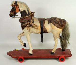 Appraisal: Large Hide Covered Horse Pull Toy Large hide covered horse