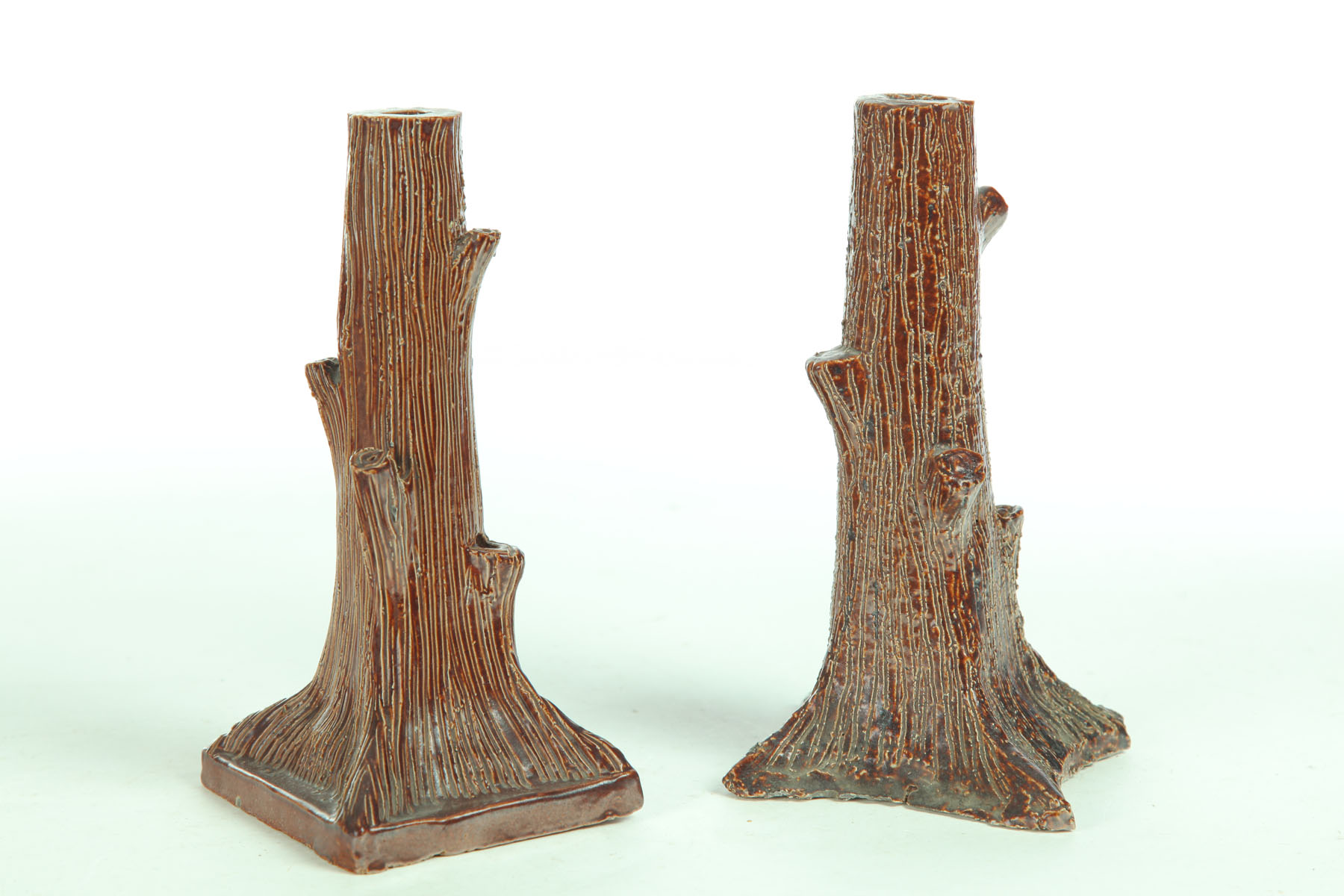 Appraisal: TWO SEWERTILE TREE TRUNK LAMP BASES Ohio early th century