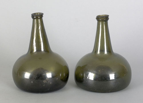 Appraisal: Two blown olive glass squat bottles th c h