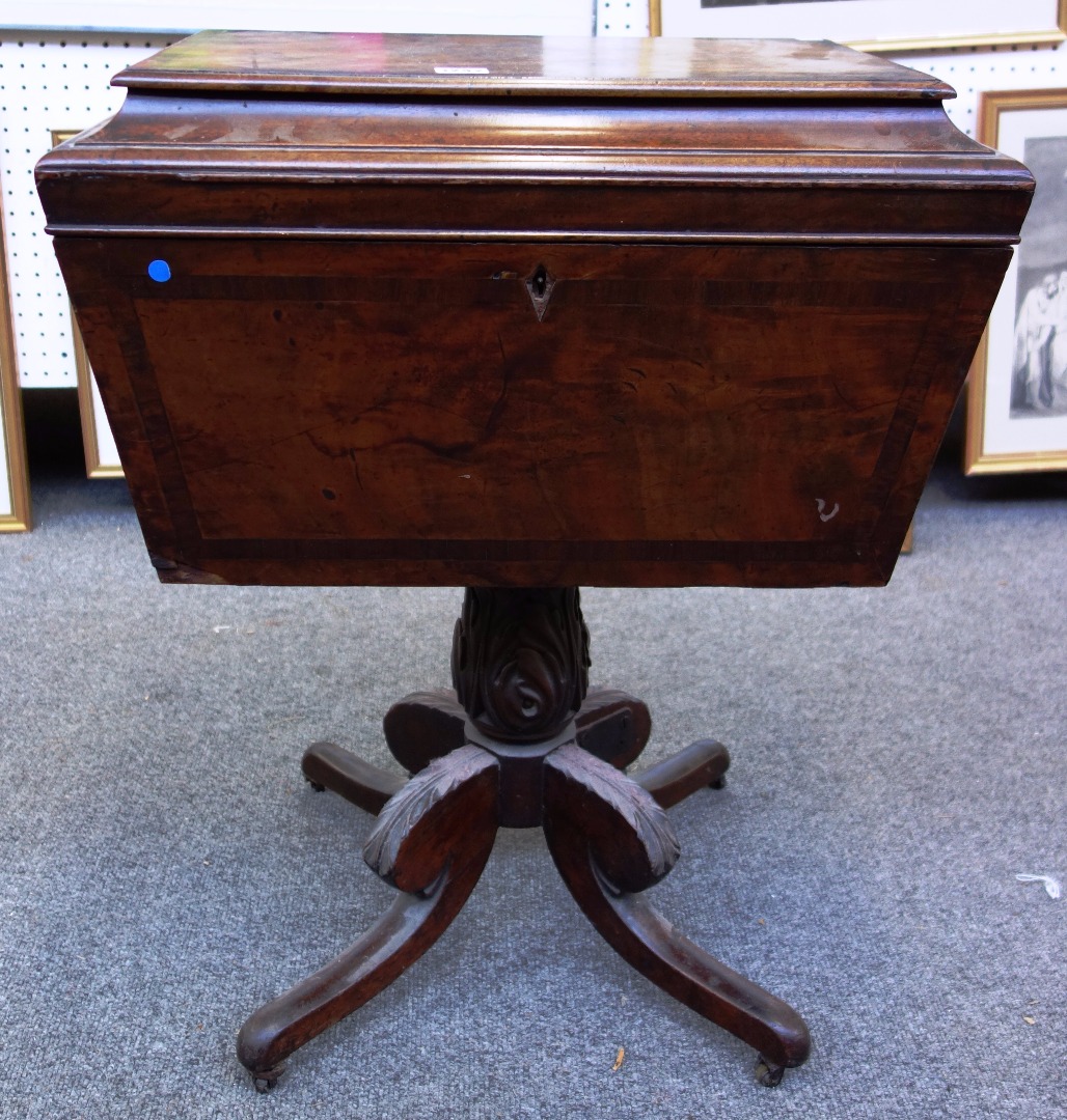 Appraisal: An early th century crossbanded mahogany cellarette of sarcophagus form