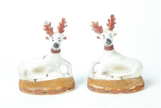 Appraisal: PAIR OF CHALKWARE DEER American th century Reclining deer hand