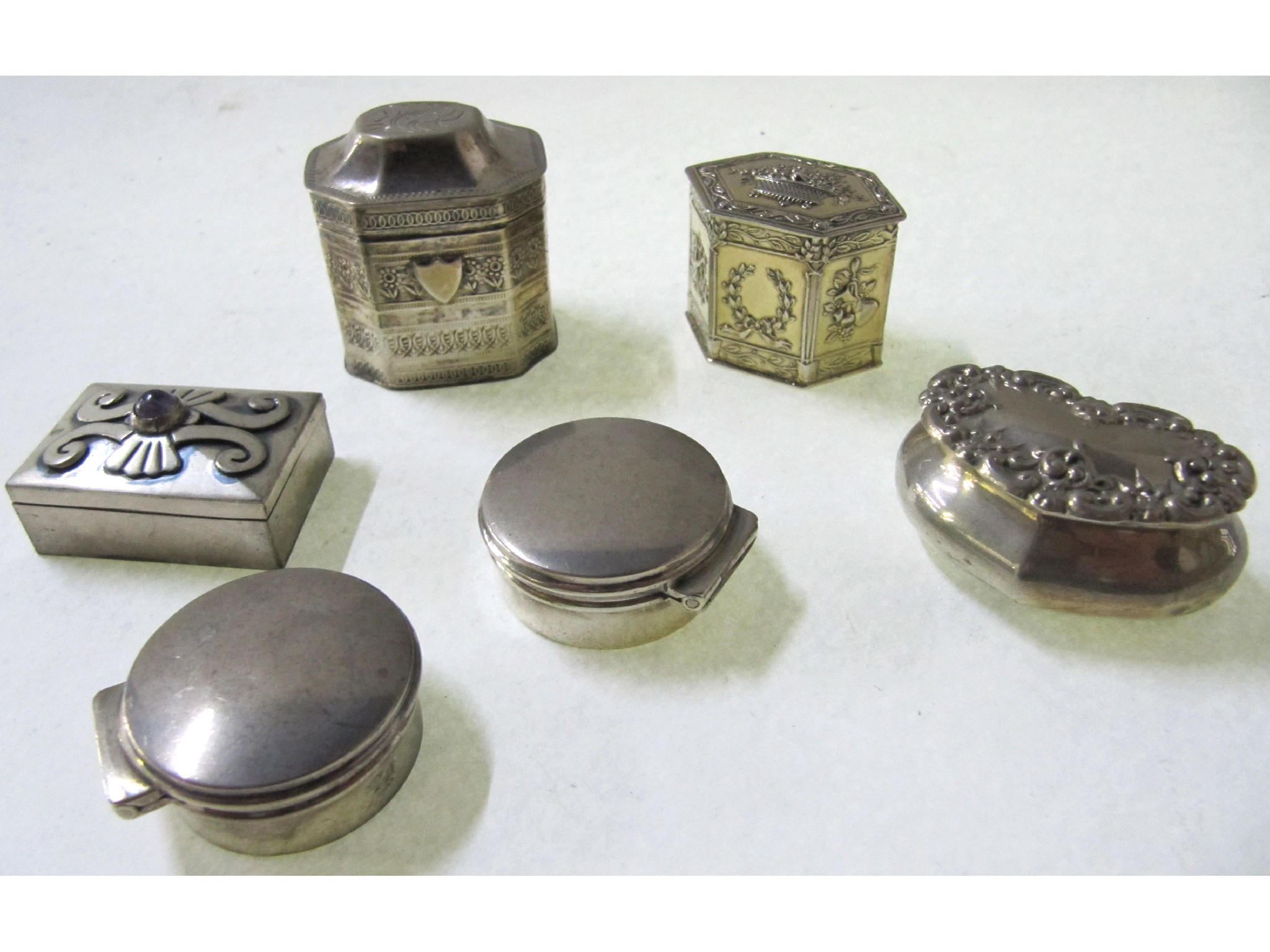 Appraisal: A lot comprising six assorted silver pill boxes mostly continental