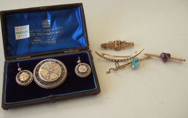 Appraisal: A Victorian circular silver brooch with a matching pair of