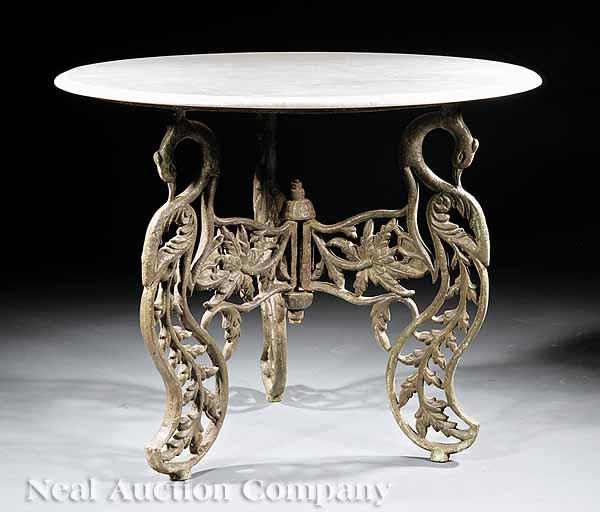 Appraisal: A Cast Iron Center Table the circular white marble top