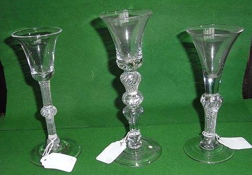 Appraisal: A DRINKING GLASS with air twist and knop stem and