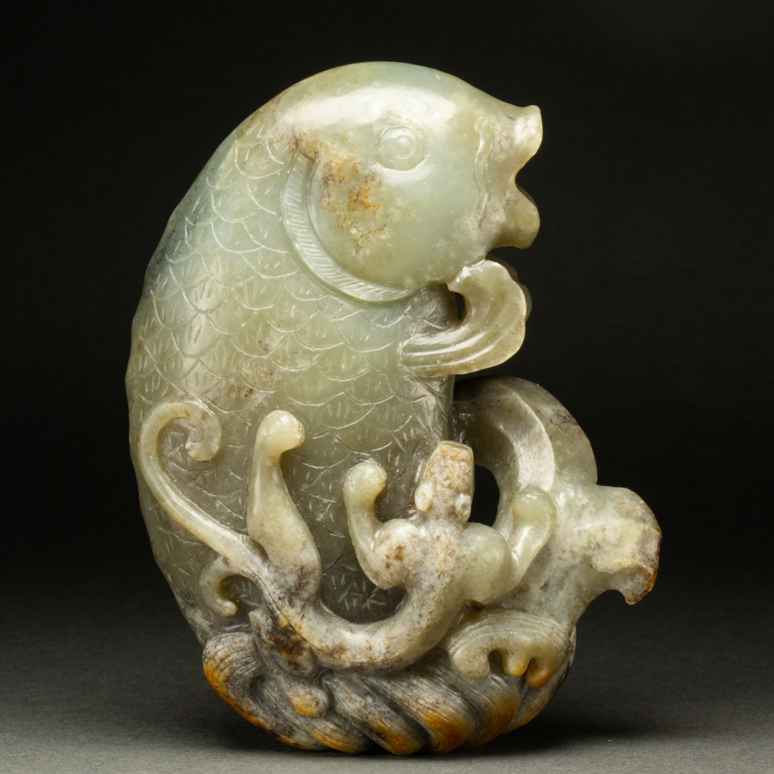 Appraisal: CHINESE CELADON JADE CARVING Chinese celadon jade carving the mottled