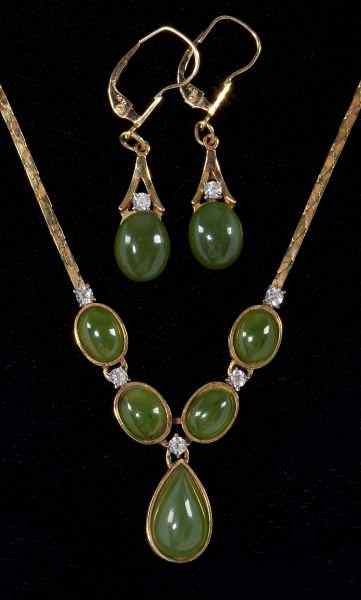 Appraisal: Diamond and Jade Necklace and Earringsthe necklace set with oval