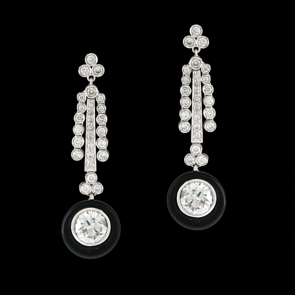 Appraisal: Pair Of Platinum Drop Earrings each set with a brilliant