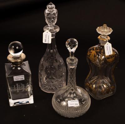 Appraisal: Two Victorian decanters and stoppers with cut and engraved decoration