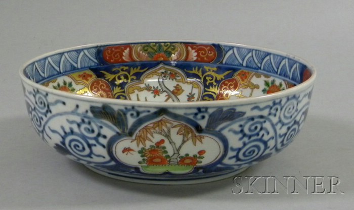 Appraisal: Polychrome Imari Bowl depicting multiple floral and garden scenes with