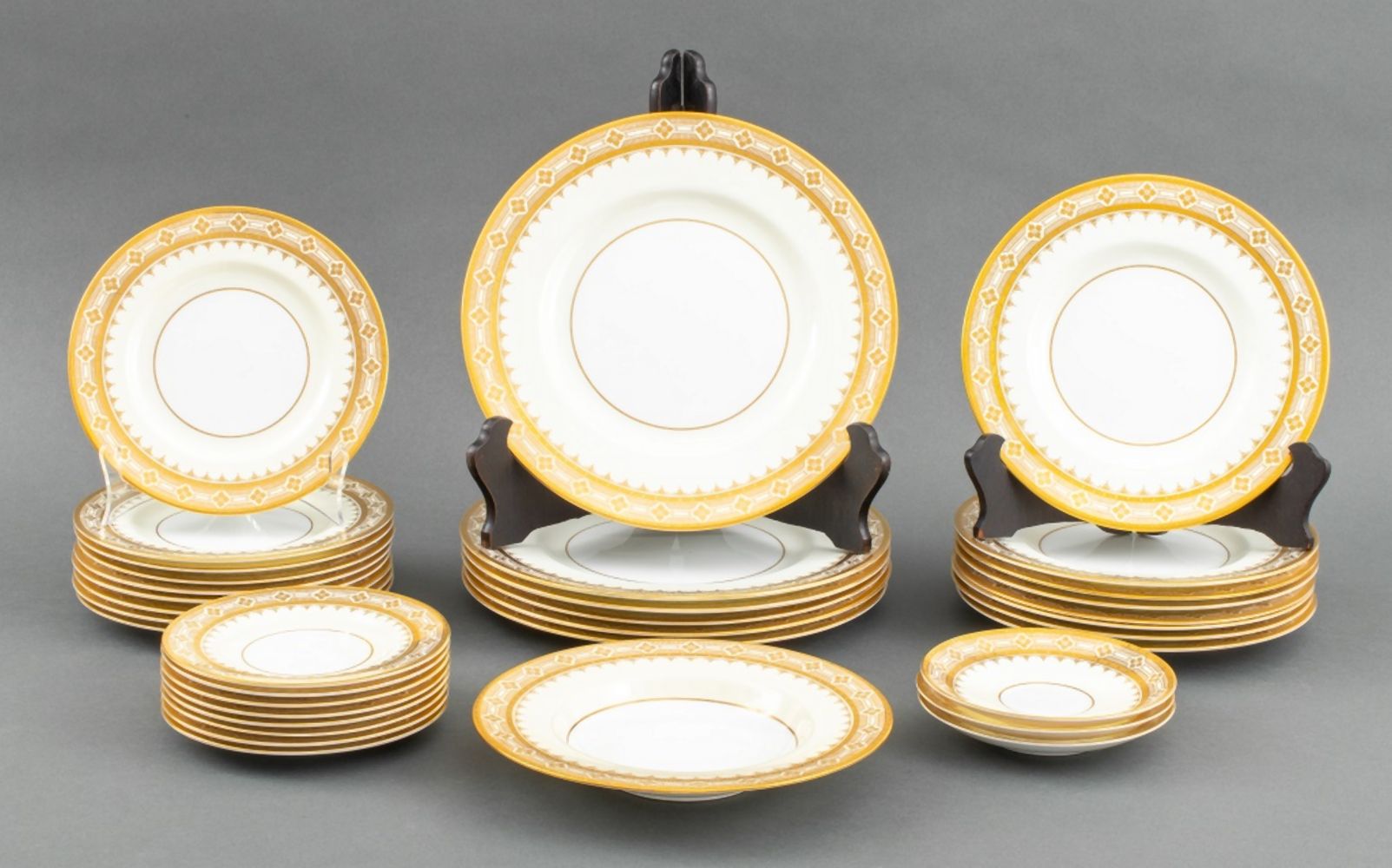 Appraisal: MINTON FOR TIFFANY CO GILT AND CREAM PART SVC Minton