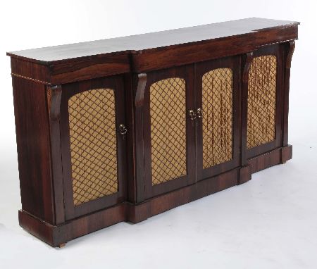 Appraisal: A William IV rosewood breakfront low bookcase the arched doors