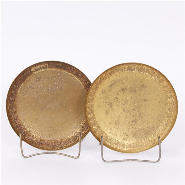 Appraisal: Pair Tiffany Studios gilt bronze plates with decorative border dia