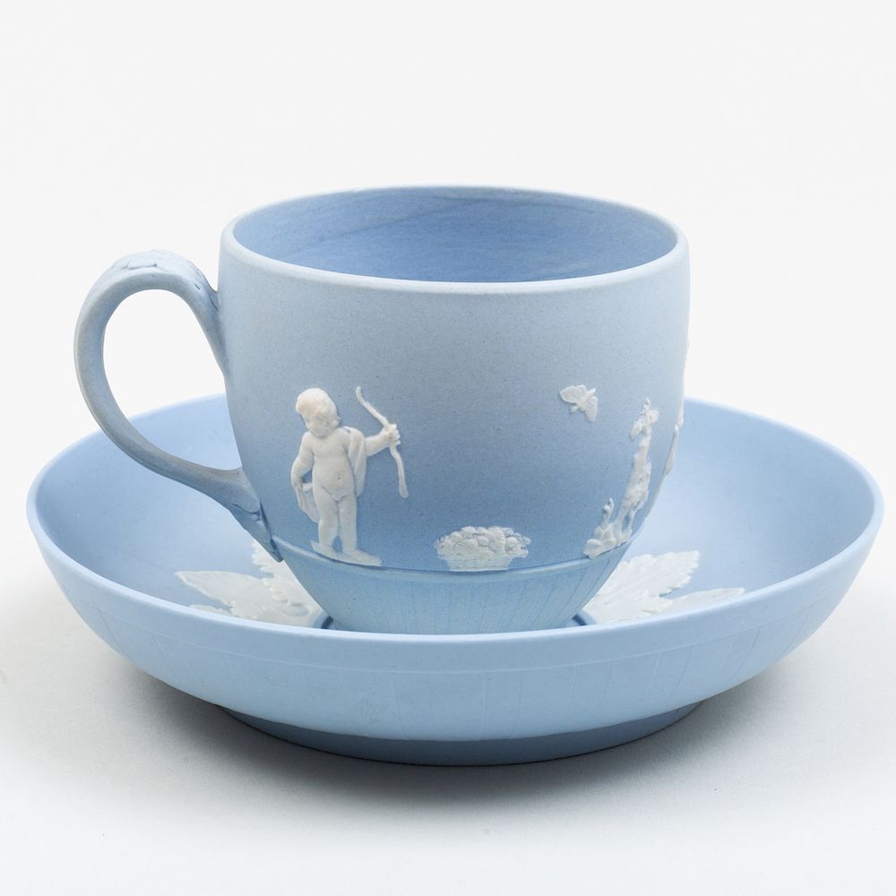 Appraisal: Wedgwood Blue and White Jasperware Cup and Saucer Impressed lowercase