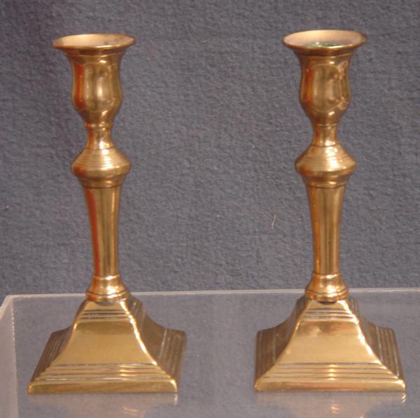 Appraisal: Pr early brass pushup candlesticks square bases tall Estimate -