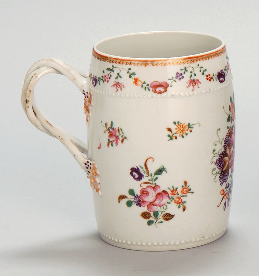 Appraisal: CHINESE EXPORT PORCELAIN HANDLED MUG Early th CenturyWith floral garland