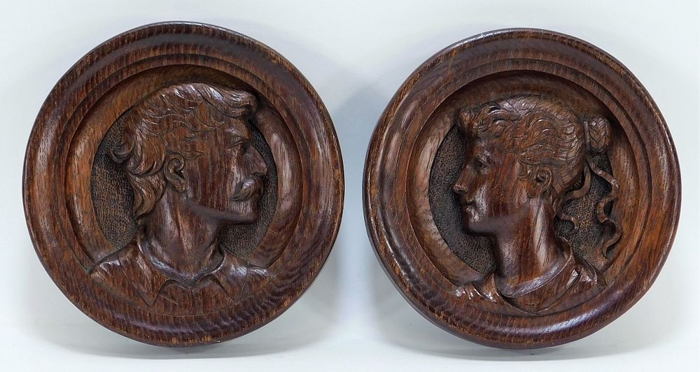 Appraisal: PR Opposing English Carved Wood Portrait Plaques England Early th