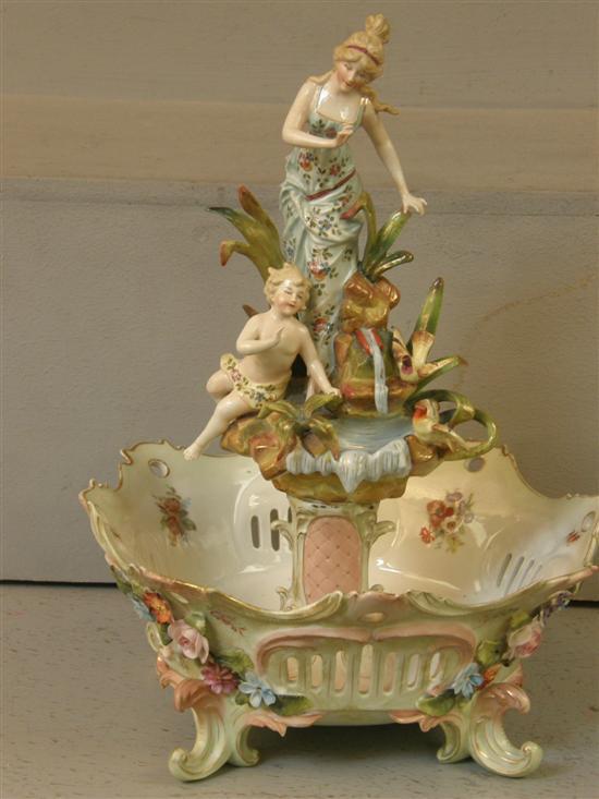 Appraisal: Late th century continental porcelain basket with central figures of