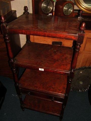 Appraisal: An early th Century four tier whatnot with fitted drawer