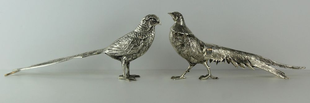 Appraisal: SILVER Two Similar Silver Figural Pheasants Includes similar silver pheasants