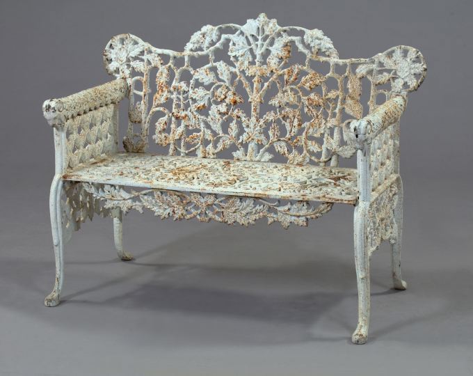 Appraisal: Diminutive Cast-Iron Garden Bench in foliate decor with a grillwork