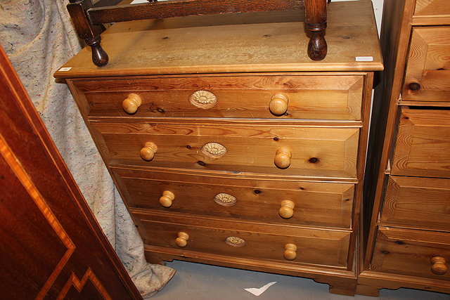 Appraisal: A PINE CHEST of four long drawers standing on bracket