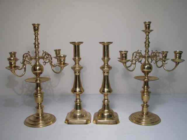 Appraisal: pairs of brass candle sticks Includes a pair of Harvin