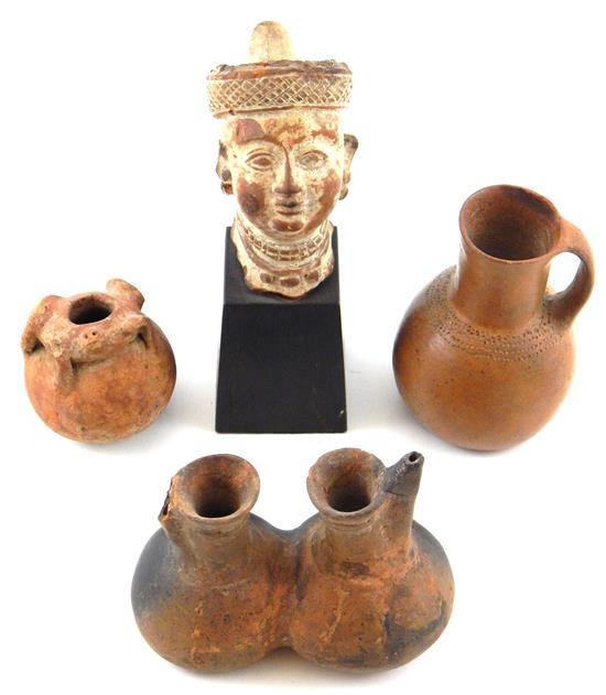 Appraisal: Early Middle Eastern pottery four pieces Assyrian terracotta head of