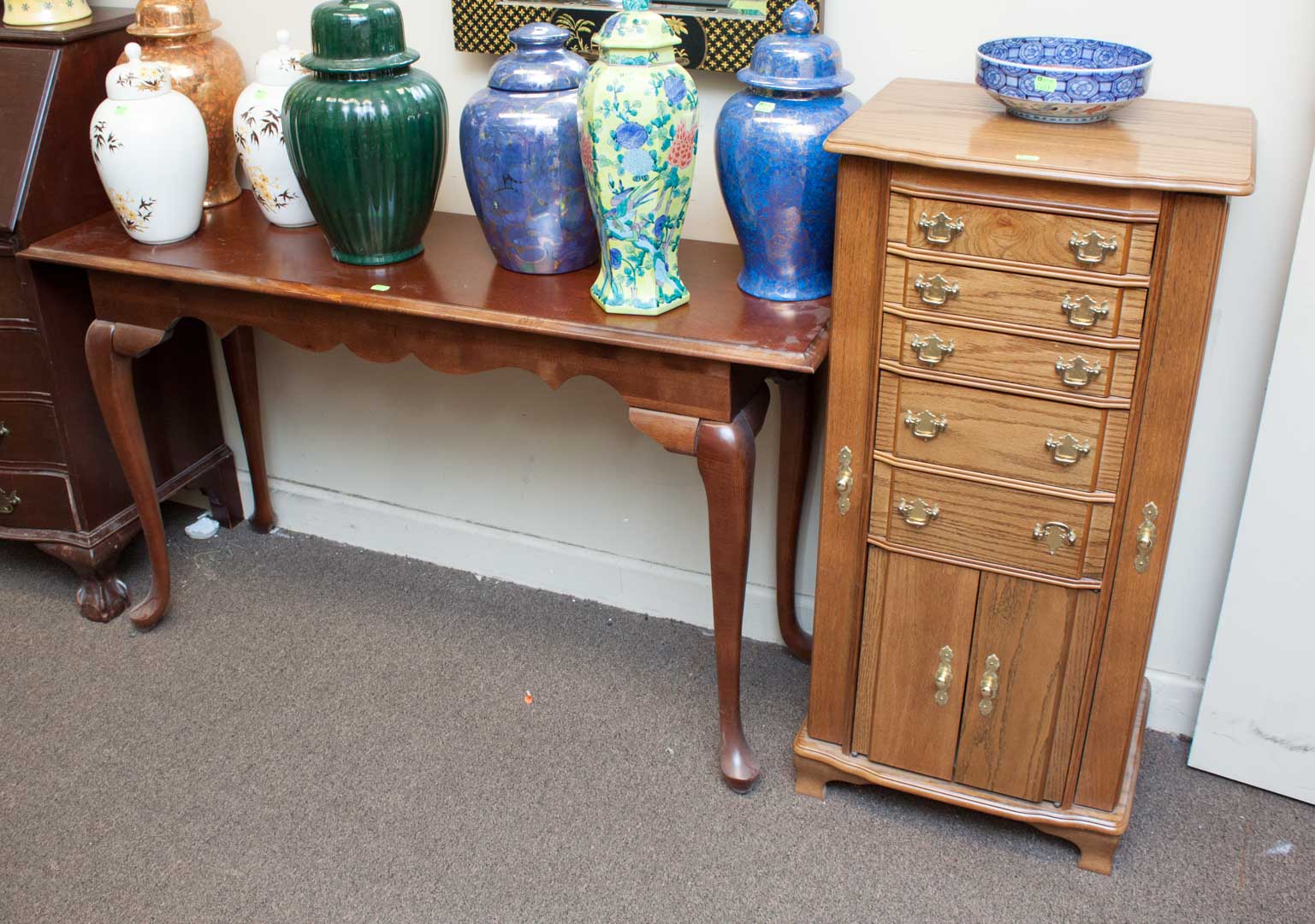 Appraisal: Oak jewelry chest and a wall table