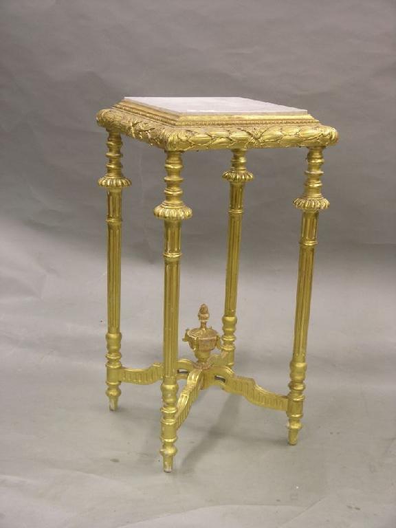 Appraisal: A th century French giltwood jardiniere stand with marble top